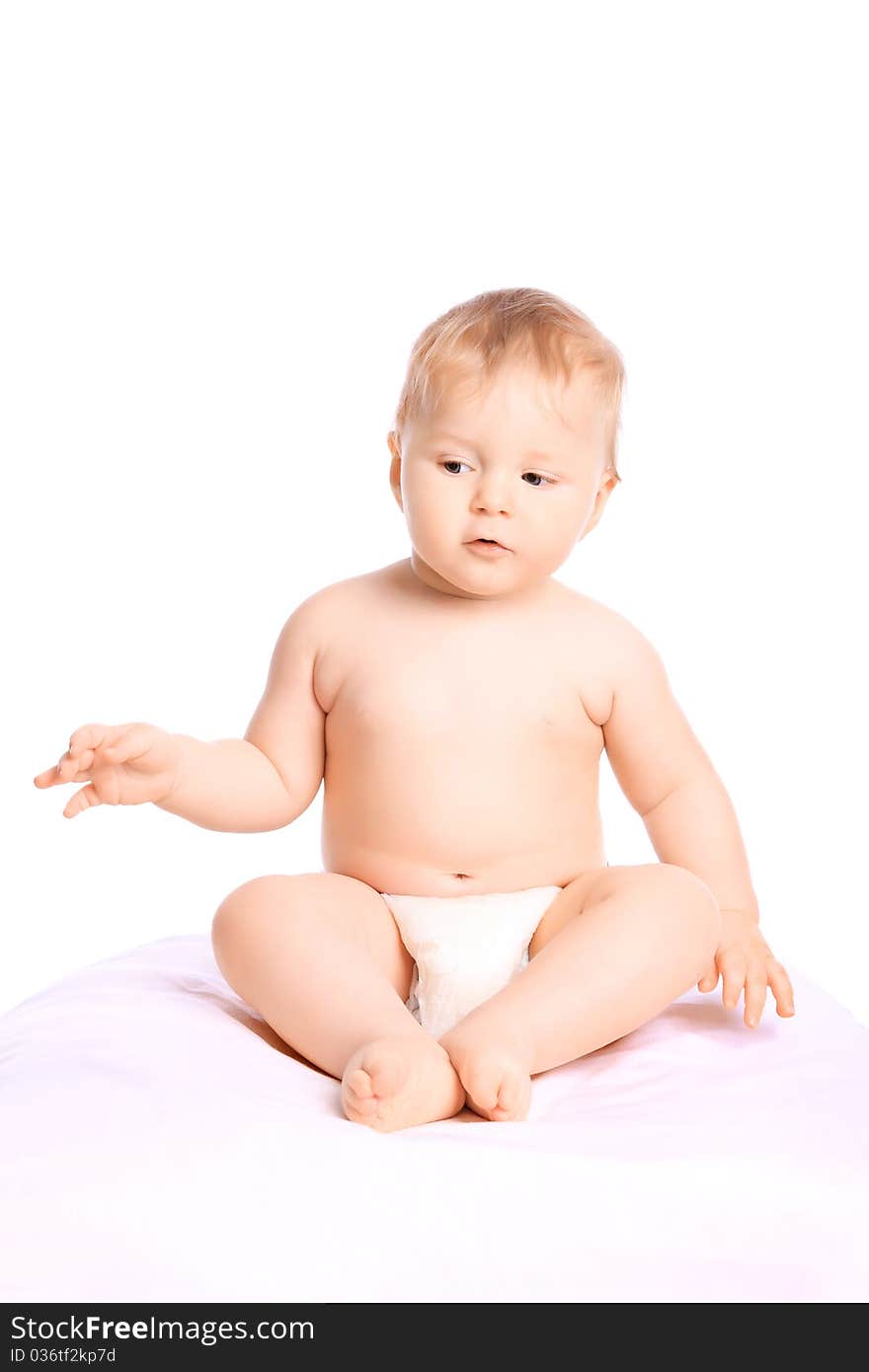 Beautiful baby. Shot in a studio. Isolated on white. Beautiful baby. Shot in a studio. Isolated on white.