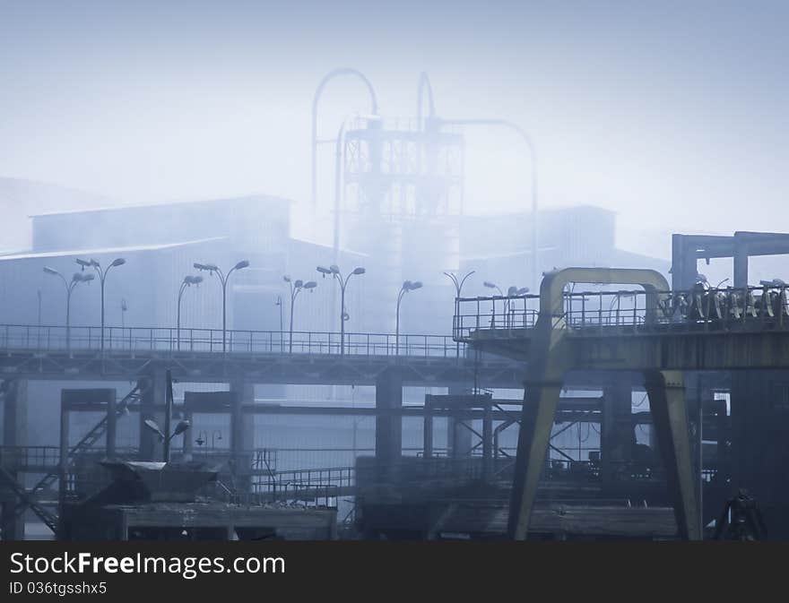 Grey, smoggy old factory polluting atmosphere located on the nile, Egypt. Grey, smoggy old factory polluting atmosphere located on the nile, Egypt