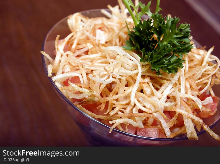 Salad with crunchy potato in glass. Salad with crunchy potato in glass