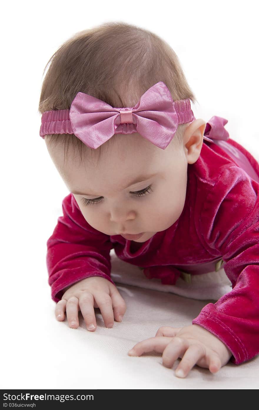 Portrait of sitting little girl isolated on white. Portrait of sitting little girl isolated on white.