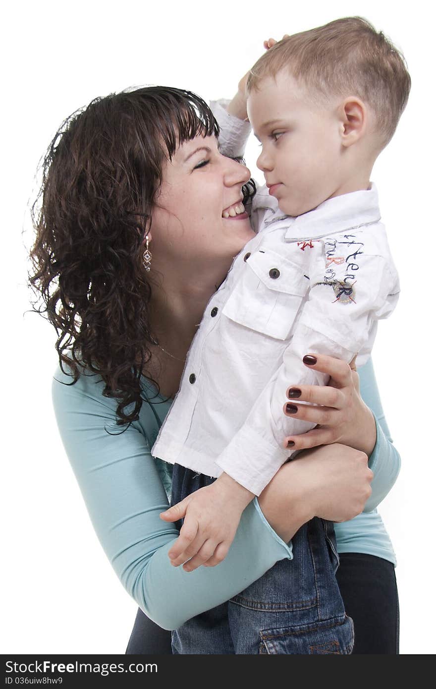 Happy mother embraces the son on a white background. Happy mother embraces the son on a white background