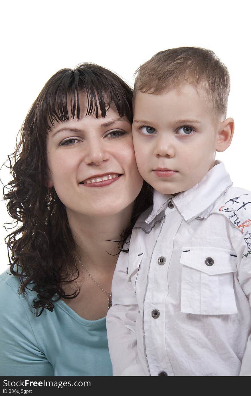 Happy mother embraces the son on a white background. Happy mother embraces the son on a white background