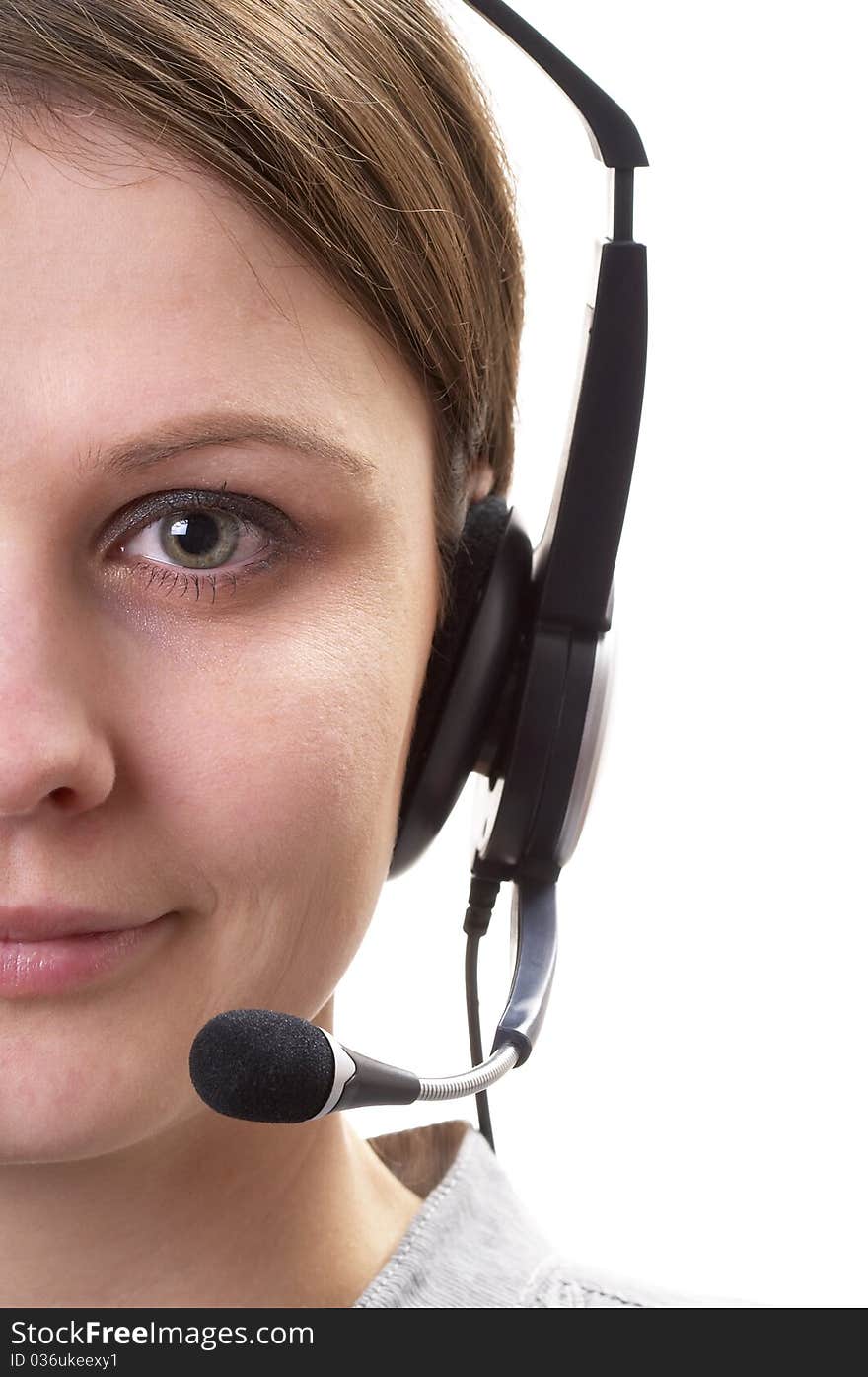 Friendly call center operator girl face fragment isolated over white background