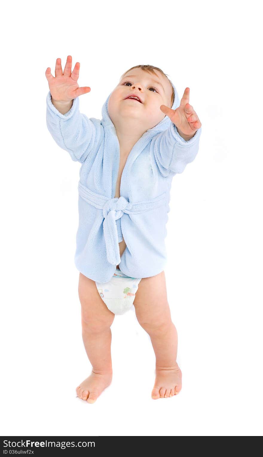 Baby in blue bathrobe on white