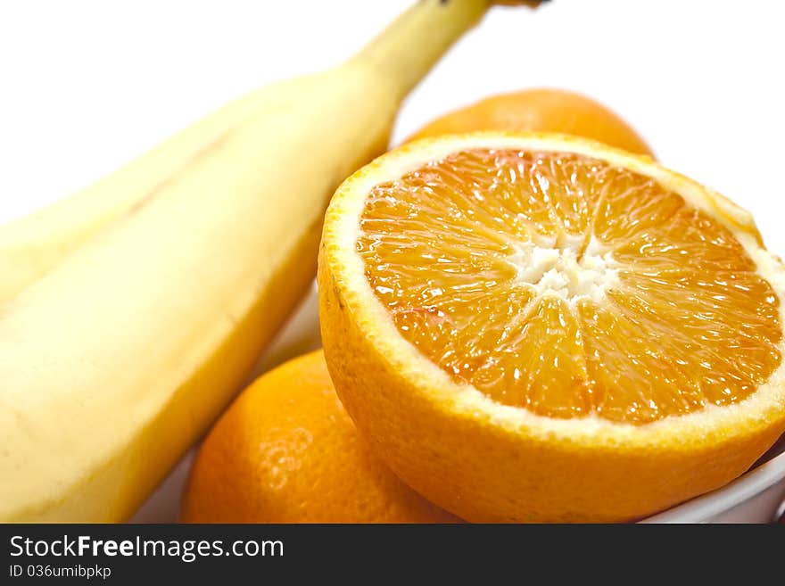 Different fruits on white background, shot close.