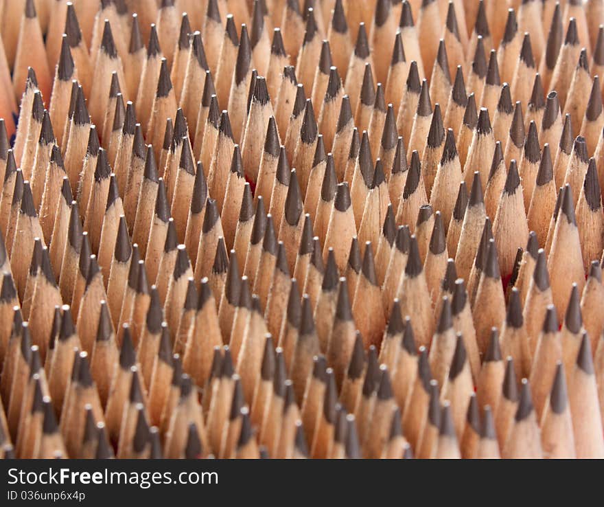 Top view of lots of sharp wooden pencils