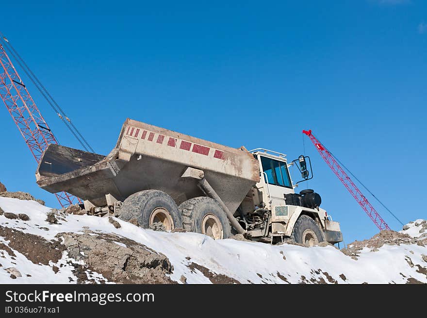 Dump Truck On A Construction Site In Winter