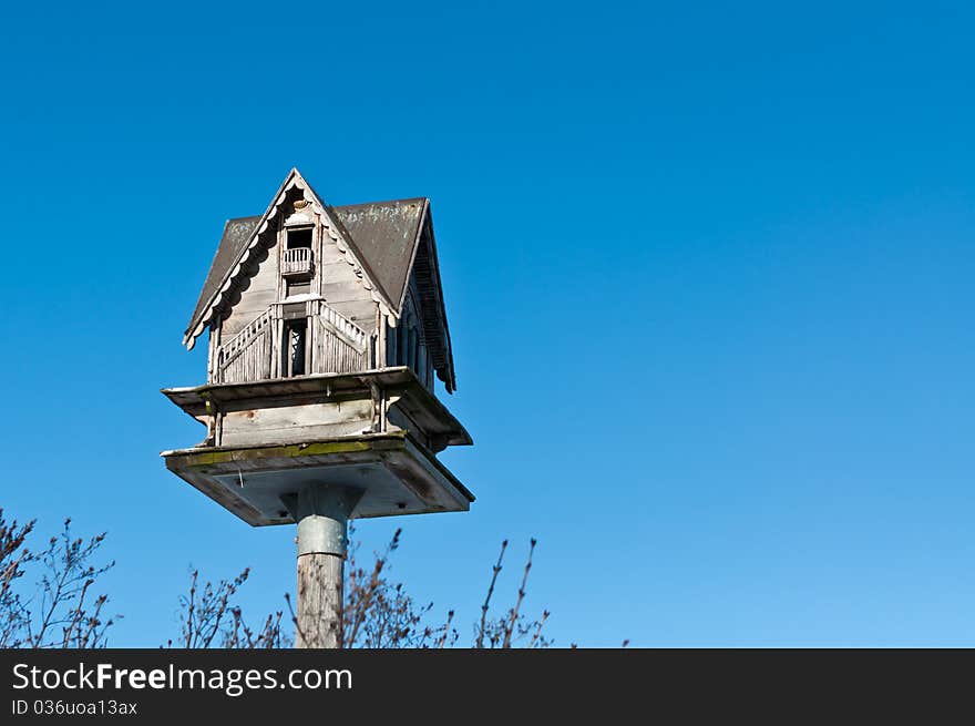 Birdhouse with Blue Sky