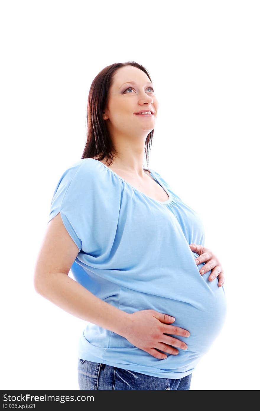 Young and beautiful pregnant woman isolated on white background