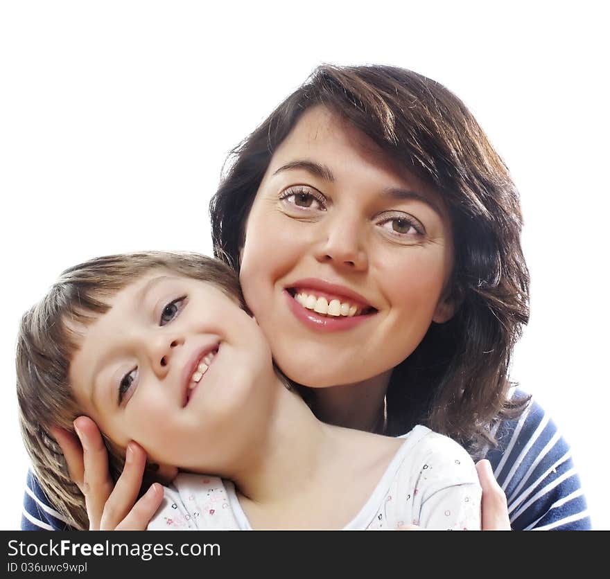 Mother and daughter looking on something and smiling