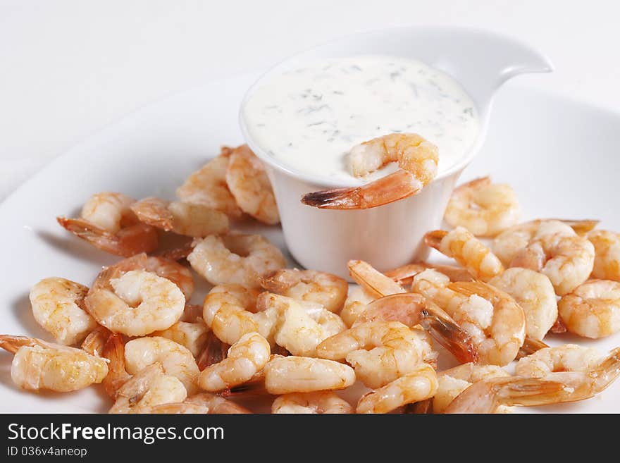 Fried prawns on a plate and sauce