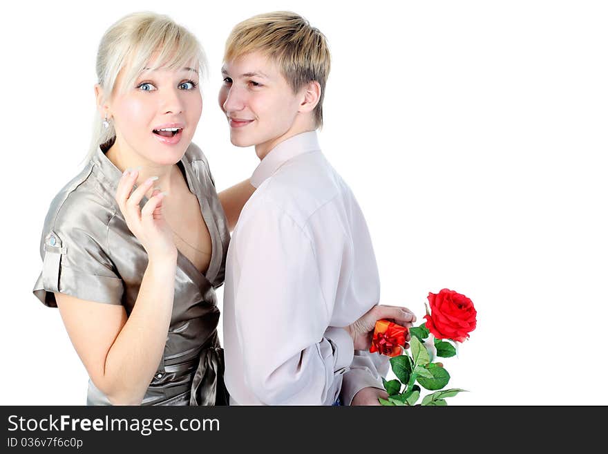 Couple with gift and flower isolated on white