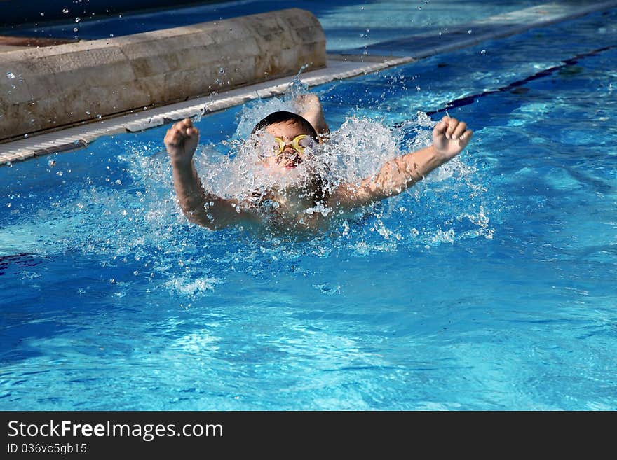 Boy swimming in the pool. Boy swimming in the pool