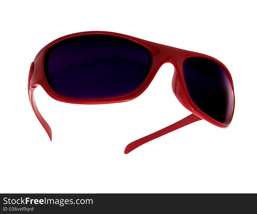 Red sunglasses isolated on white background