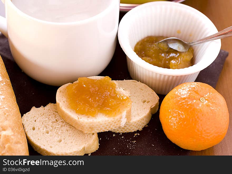 Breakfast with oranges and milk. Breakfast with oranges and milk