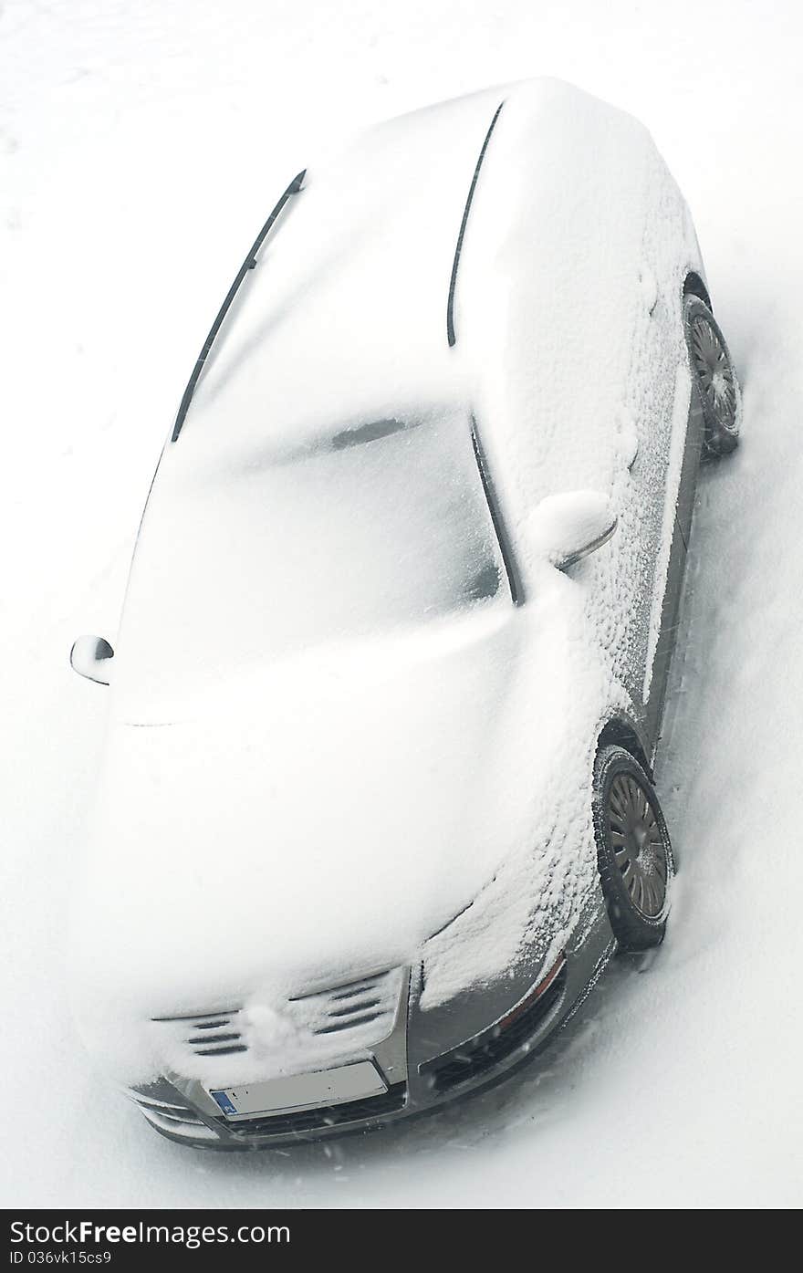 Car outside under a thick layer of snow. Car outside under a thick layer of snow