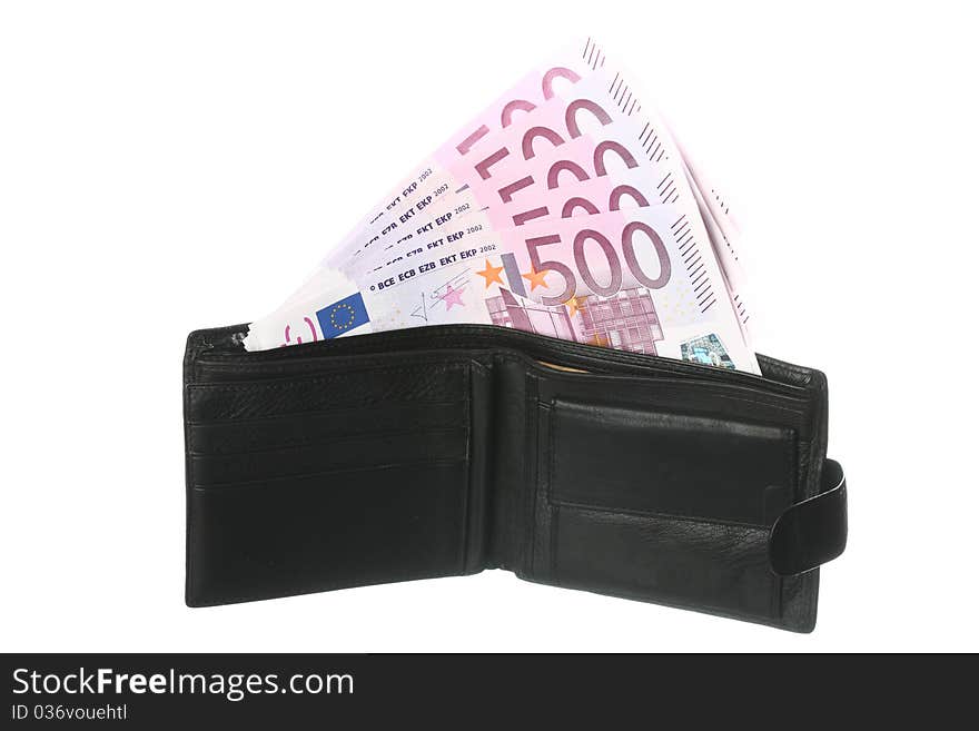 Close-up of five-hundredth euro banknotes in black leather wallet isolated on white. Close-up of five-hundredth euro banknotes in black leather wallet isolated on white