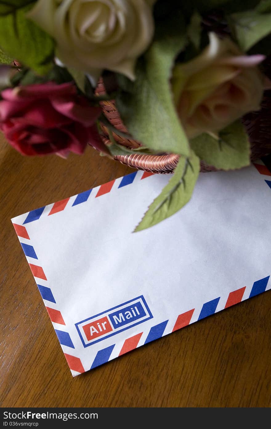 Blank airmail envelope with bouquet of roses. Blank airmail envelope with bouquet of roses