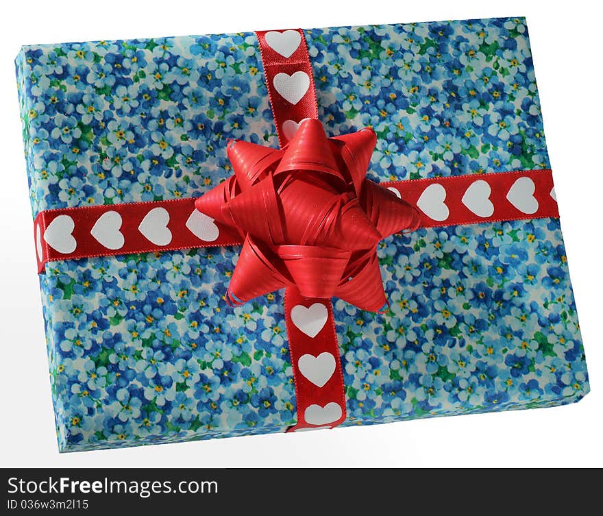 Blue box with a red hearts ribbon and a red bow. Blue box with a red hearts ribbon and a red bow