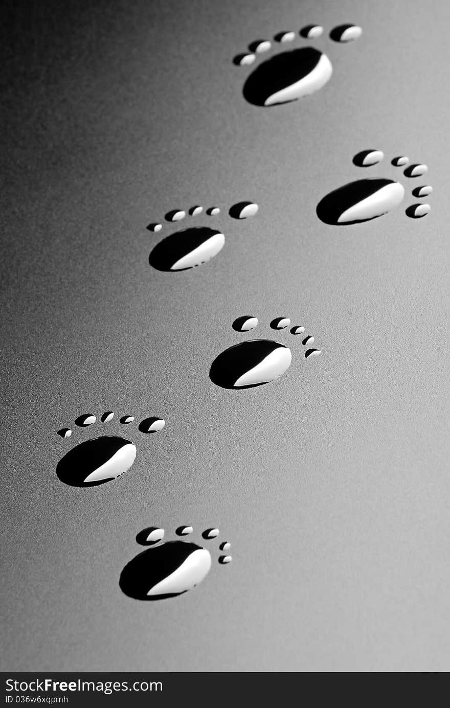 Close-up footsteps of water drops. Close-up footsteps of water drops