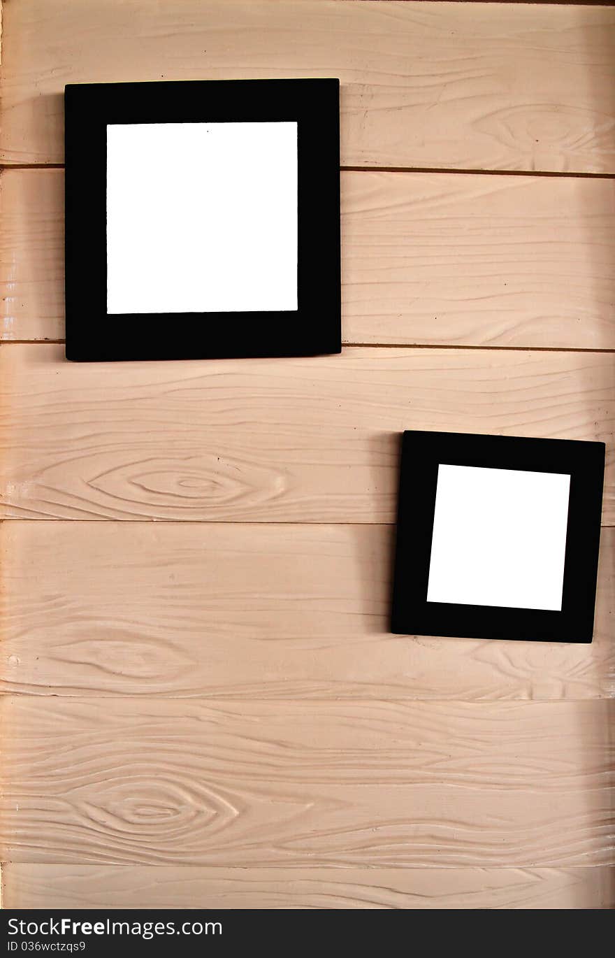 Empty picture frame on a piece of wood. Empty picture frame on a piece of wood.