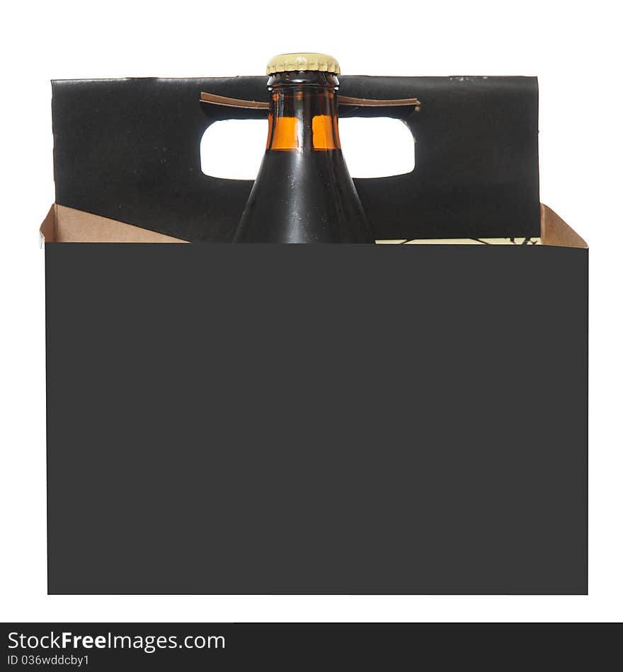 One single last beer in the cardboard six pack carton isolated on white background. One single last beer in the cardboard six pack carton isolated on white background