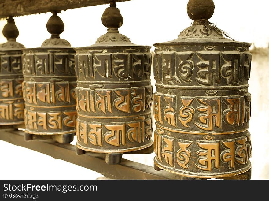 Prayer wheels in the beautiful golden temple in patan, nepal