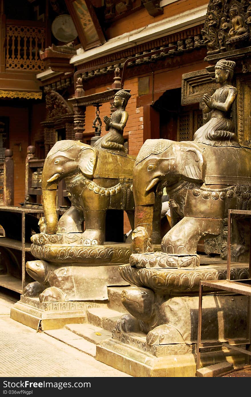 Figures in the beautiful golden temple in patan, nepal