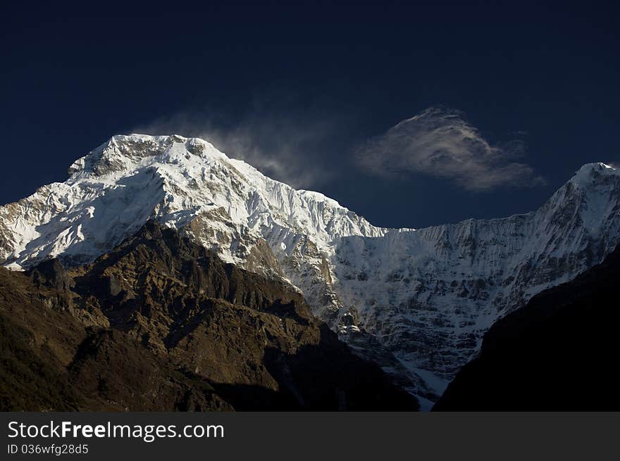 South summit of anapurna at first light