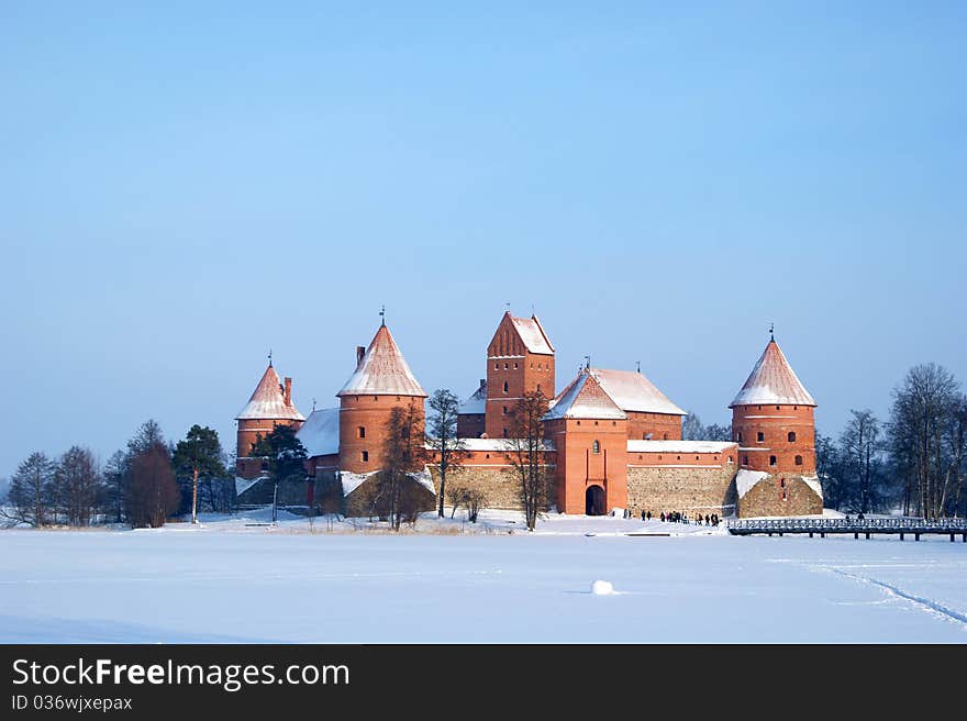 Castle on lake in winter. Castle on lake in winter