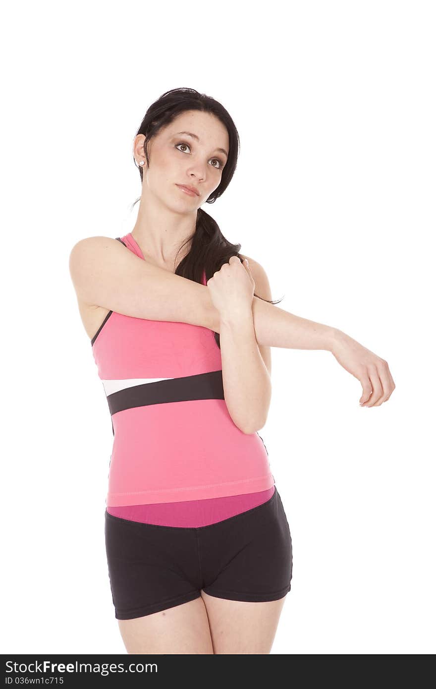 Woman in pink fitness stretching