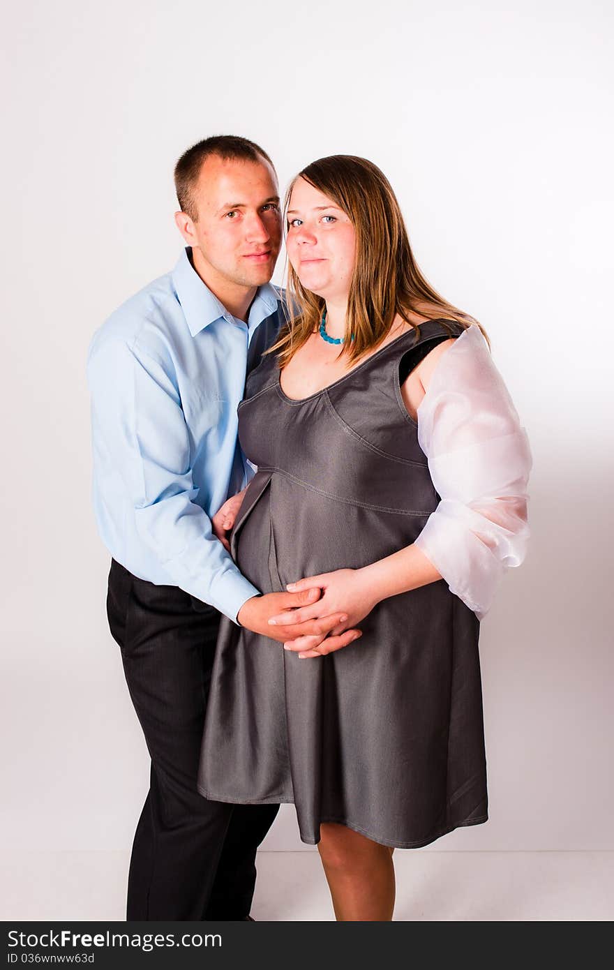 Beautiful couple in waiting for of their child. Beautiful couple in waiting for of their child