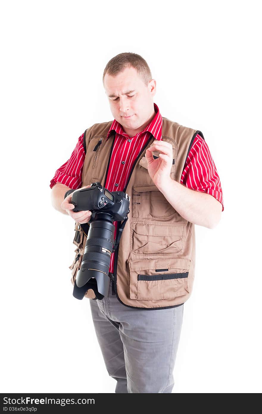 Photographer with digital kamera and zoom lens on white background