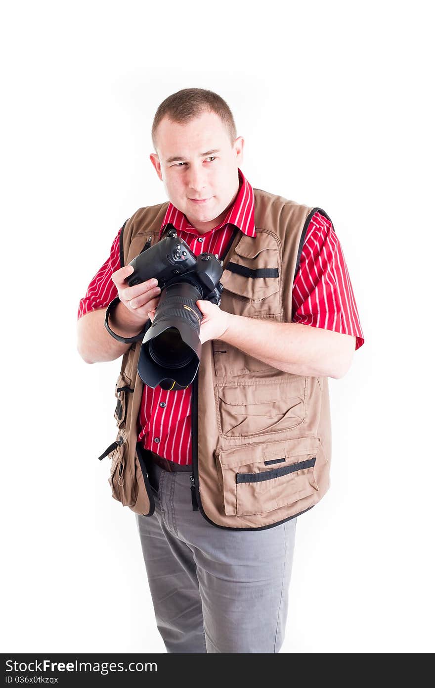 Photographer with digital kamera and zoom lens on white background