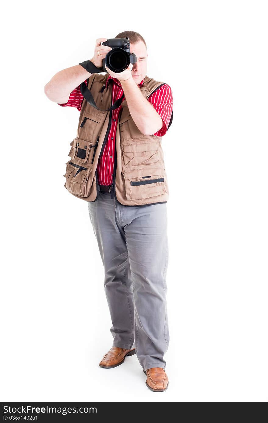 Photographer with digital kamera and zoom lens on white background