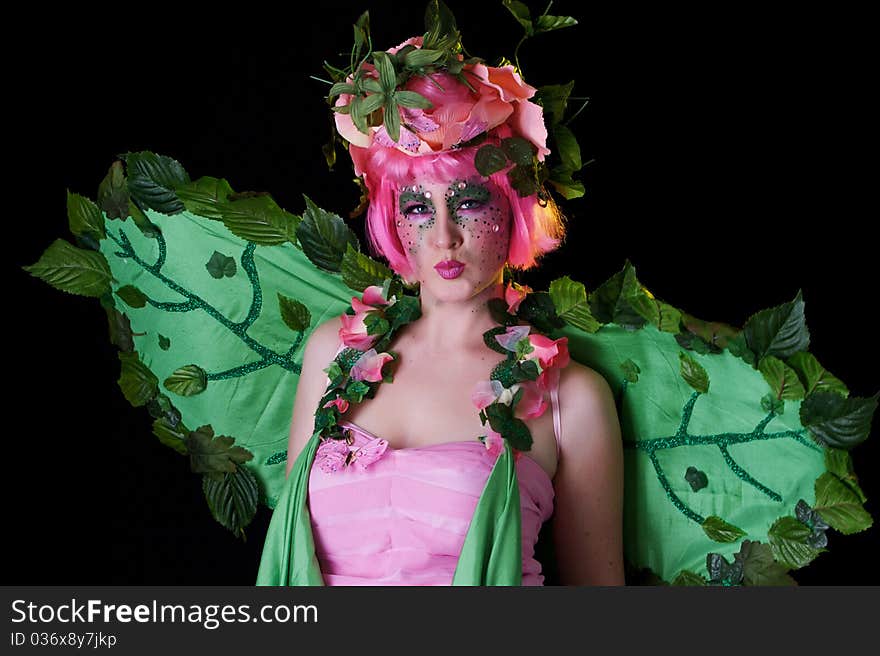 Spring Fairy portrait of model on black background. Spring Fairy portrait of model on black background