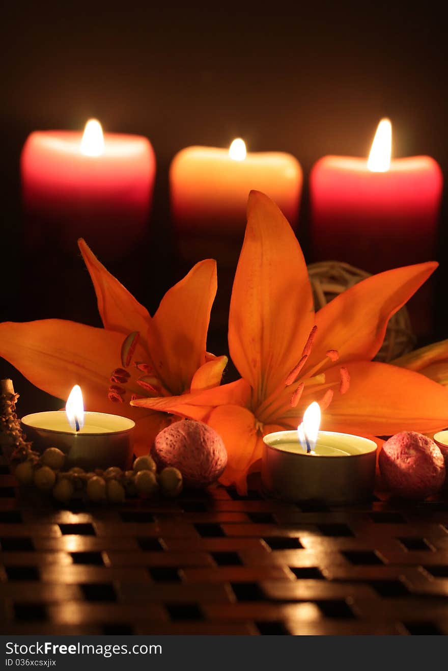 Orange Lilies scene by candlelight. Orange Lilies scene by candlelight.