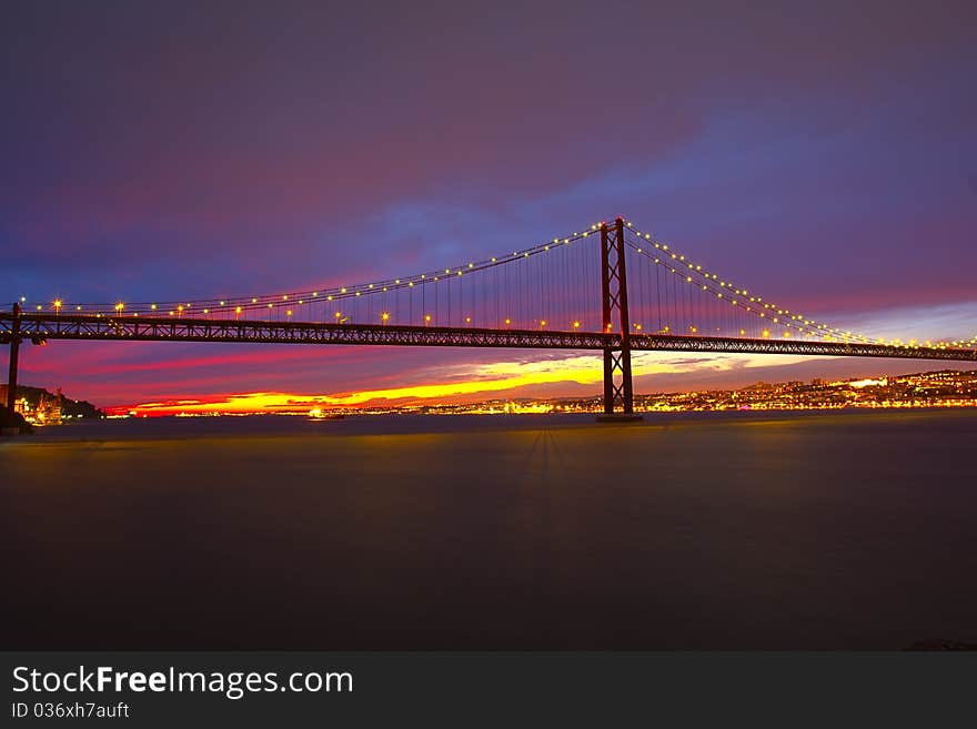 The 25 De Abril Bridge In Lisbon