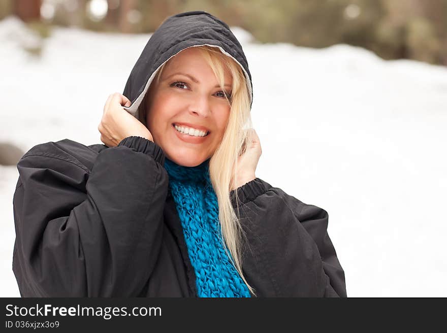 Attractive Woman Having Fun In The Snow