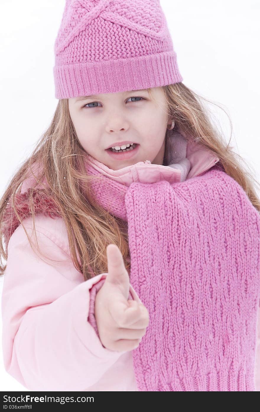 Satisfied girl in snow with pink cap room