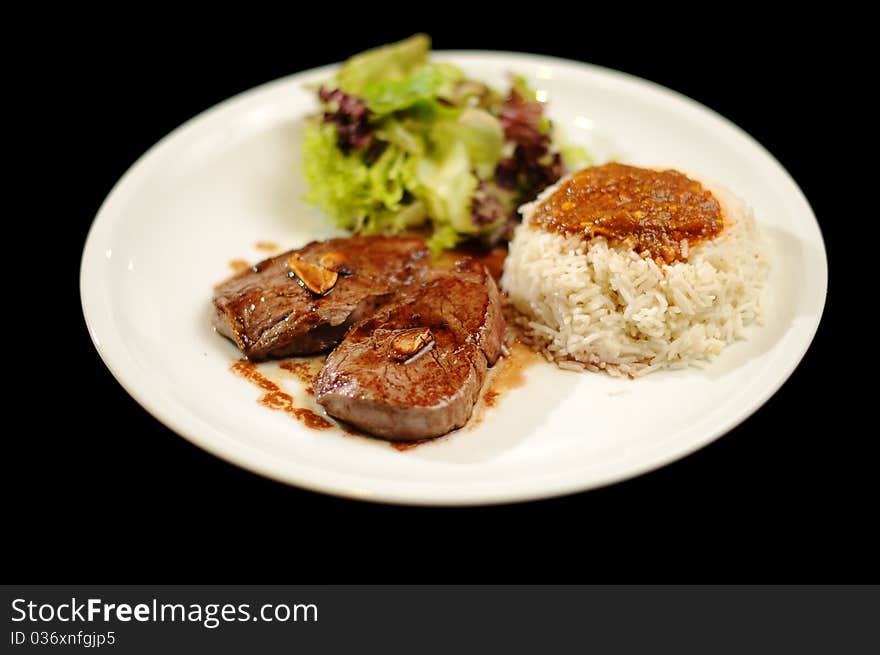 Steak Meal With Rice And Salad