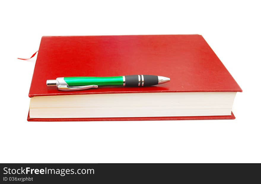 Book with green pen background