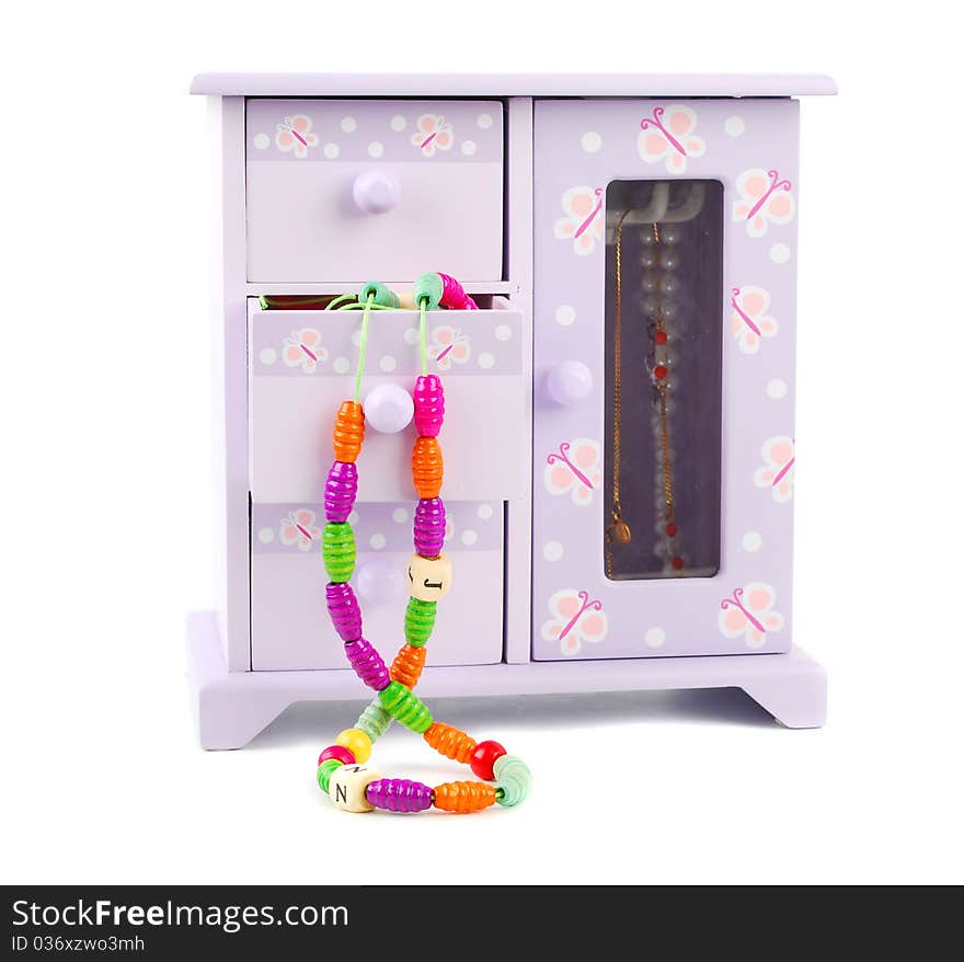 Fun purple children Jewelery box with necklaces on white background.