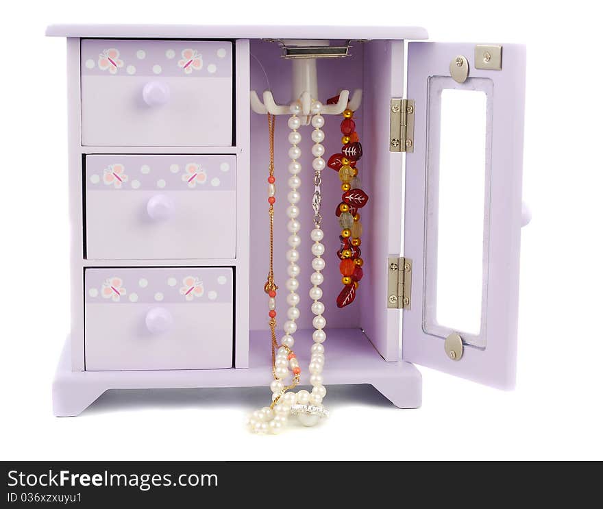 Fun purple children Jewelery box with necklaces on white background.