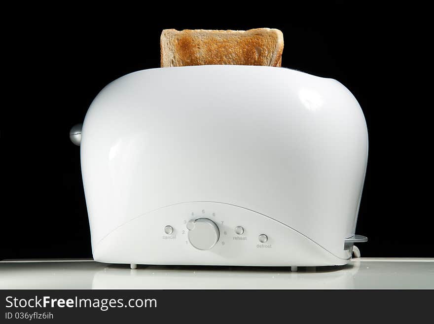 White toaster with two toasts