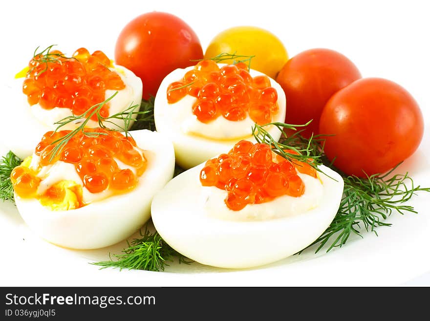 Eggs with caviar and dill tomatoes. Eggs with caviar and dill tomatoes