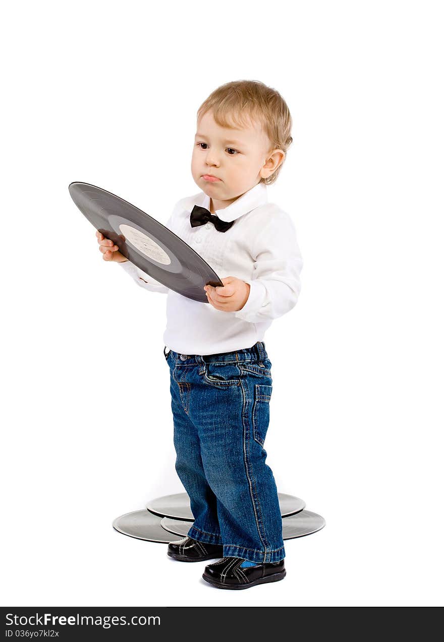 The little boy with phonograph records on white isolated