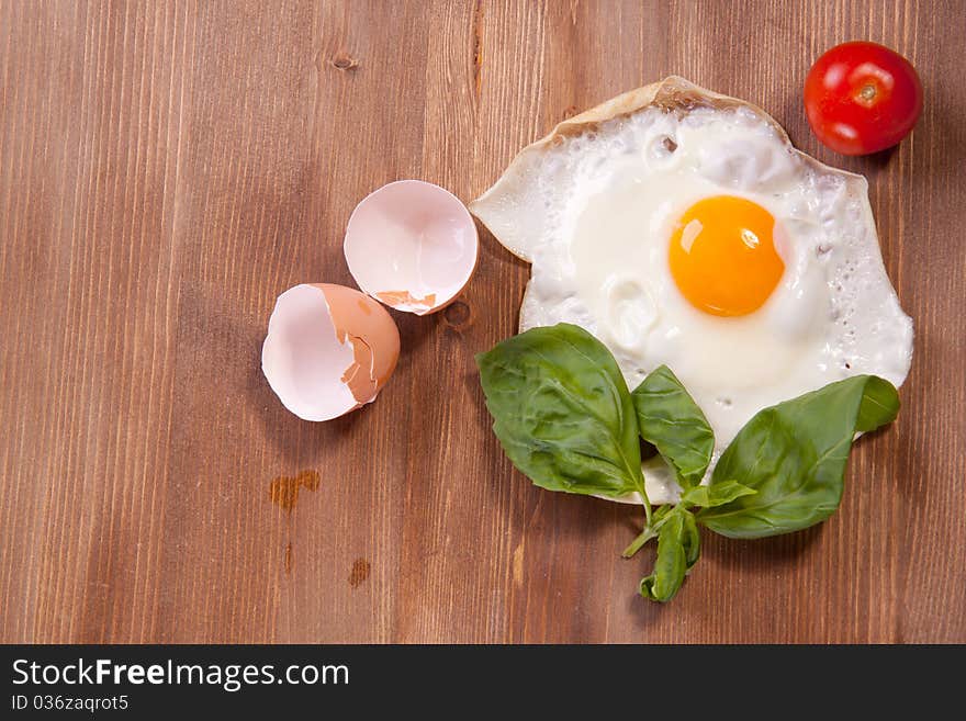 Fried egg with tomato