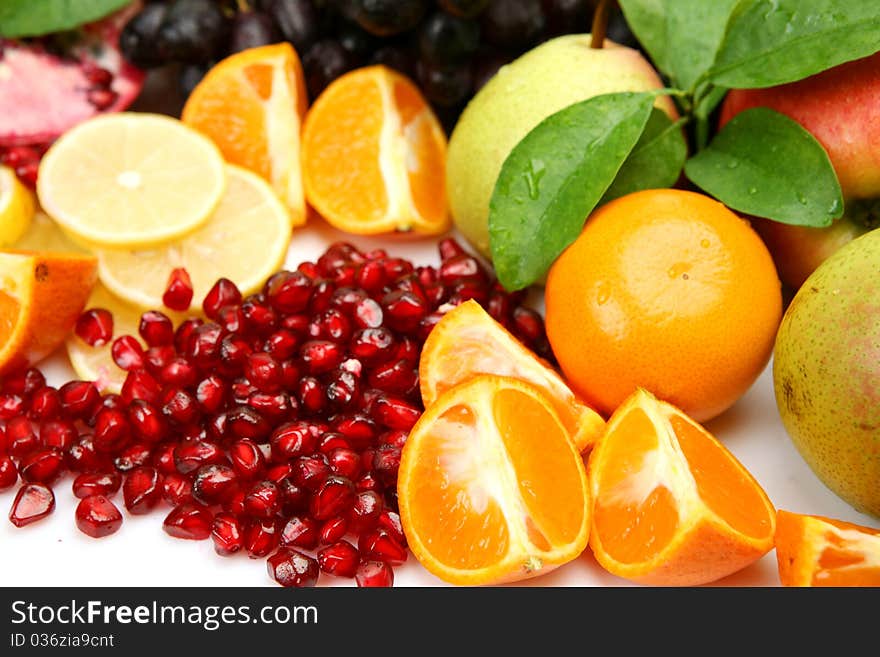 Ripe fruit on a white background