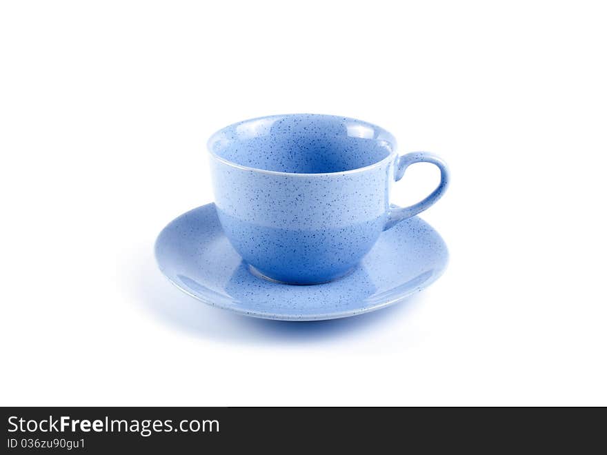 Blue cup with saucer isolated on white background